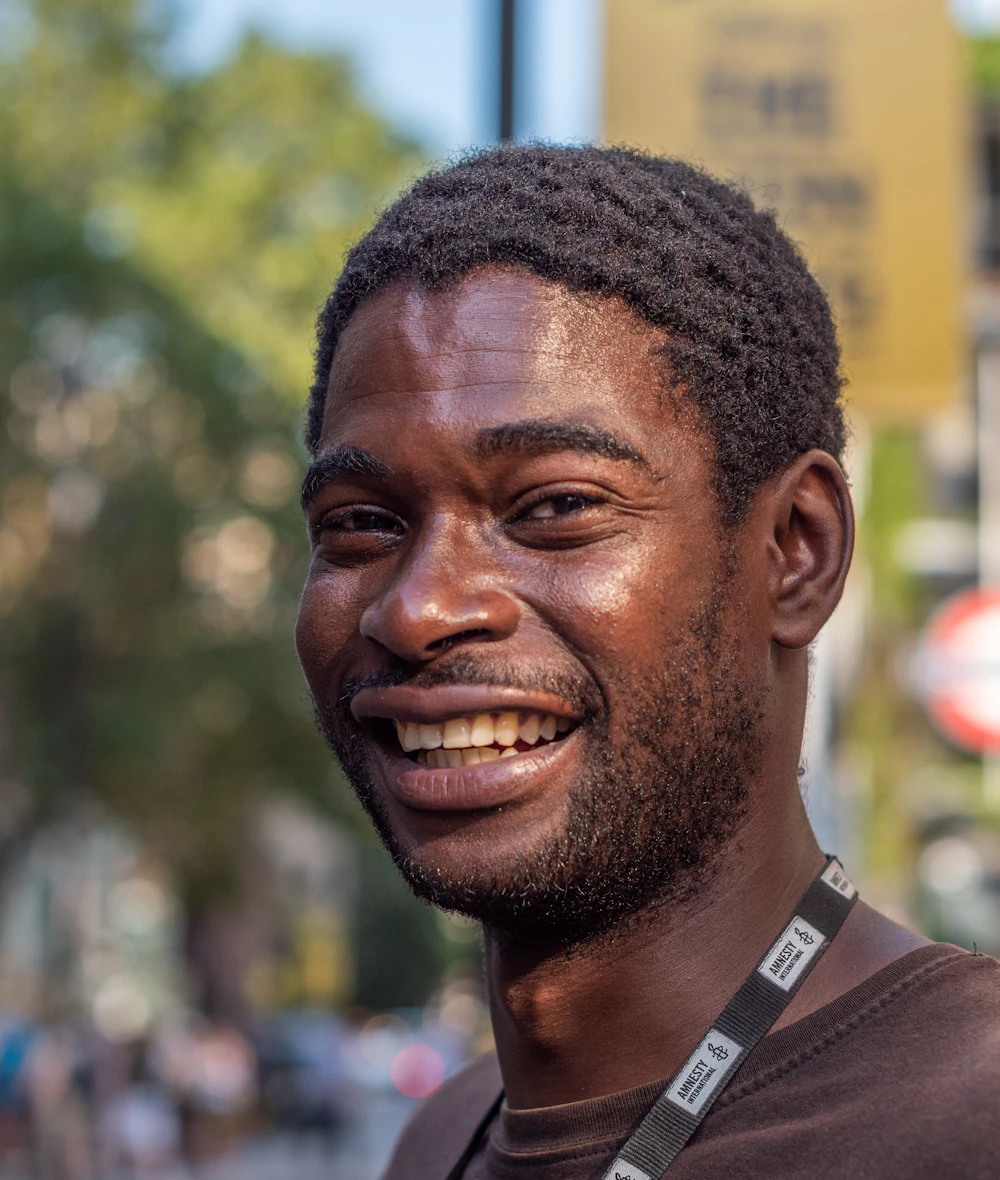 A founder laughing on a London street
